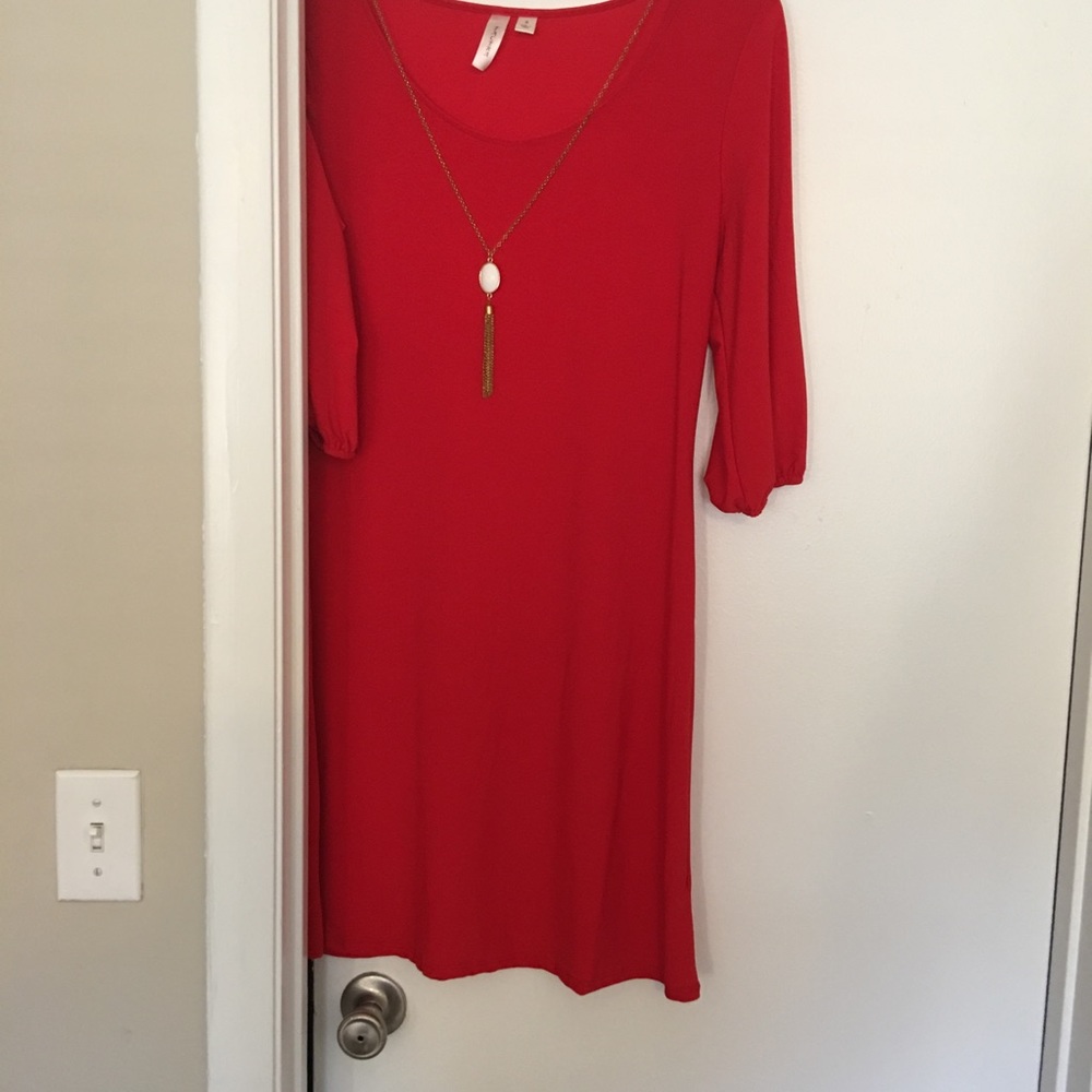 Beautiful red dress with chain accent