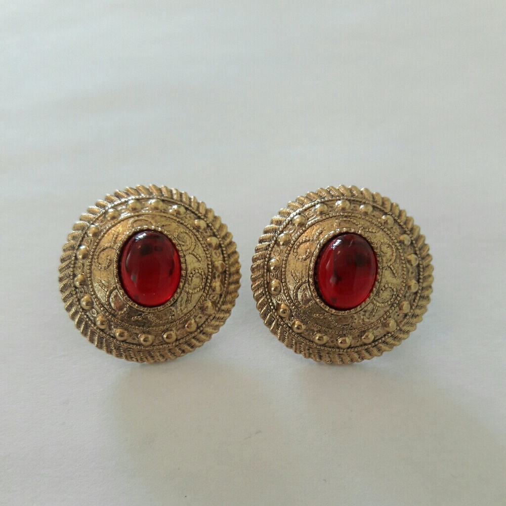 Ornate gold and red earrings