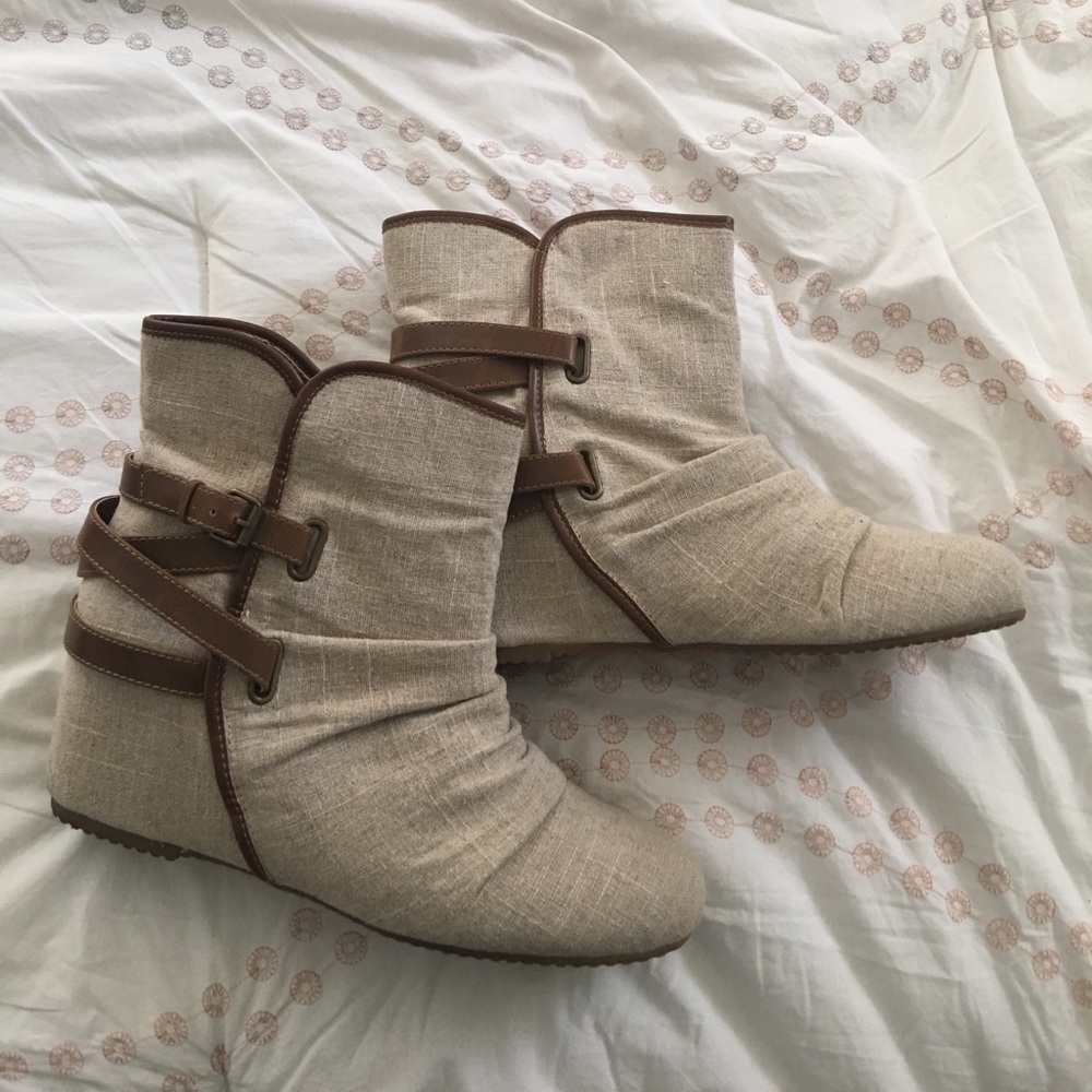 Aldo canvas wedge bootie w/ leather strap detail.