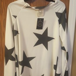 Star knit shirt over the shoulder