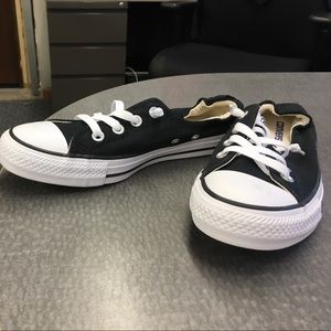Black converse tennis shoes