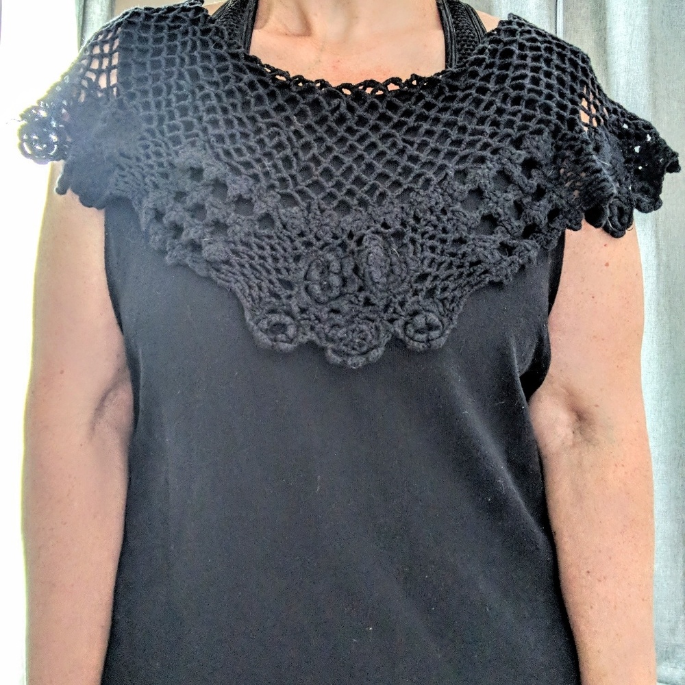 Black sleeveless top with knit lace overlay