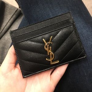 Black leather and gold detailed card case