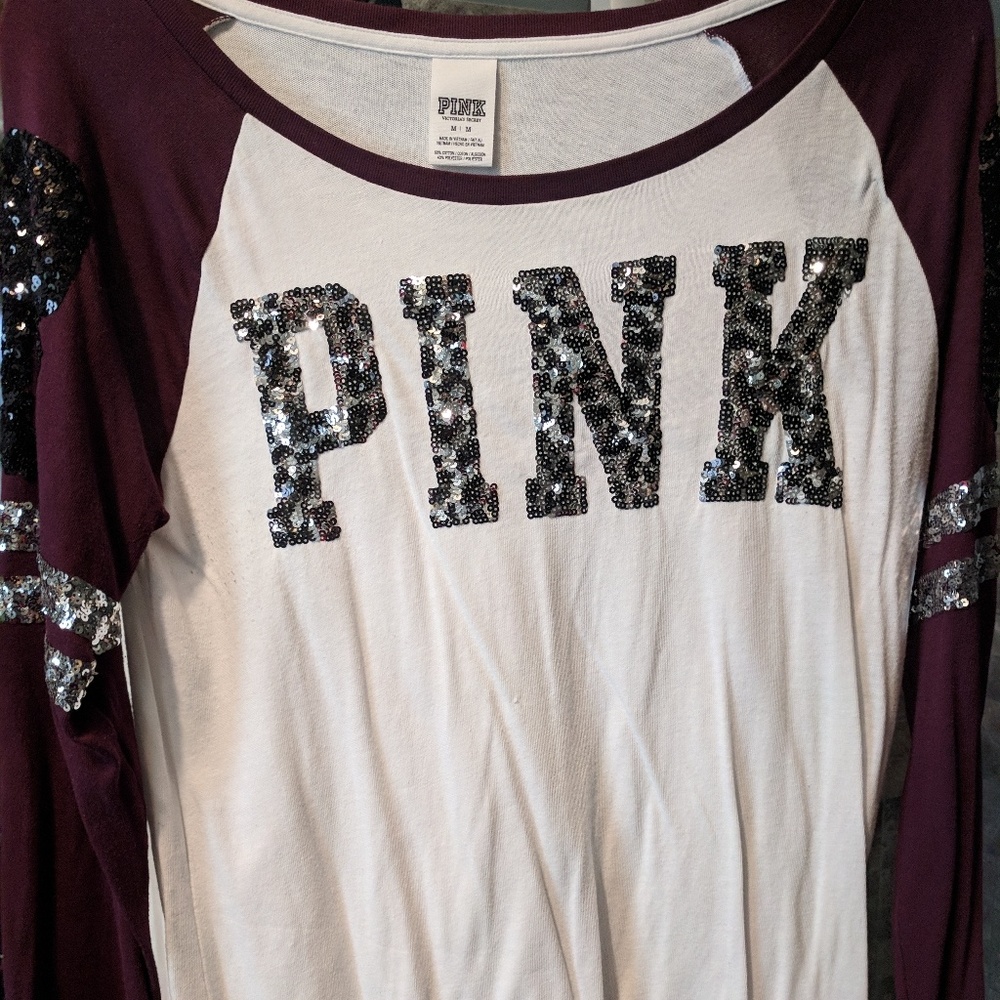 Womans long sleeved Vs sequin shirt.