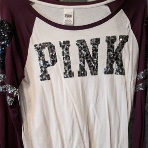 Womans long sleeved Vs sequin shirt.