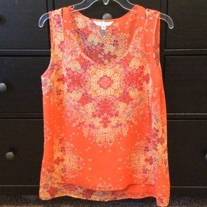 Sleeveless orange sheer blouse