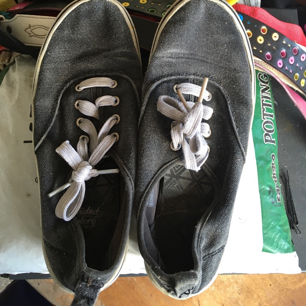 Old black sneakers