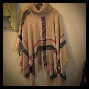 Burberry pattern poncho.  One size