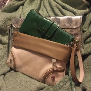 3 clutch/ wristlets bags.