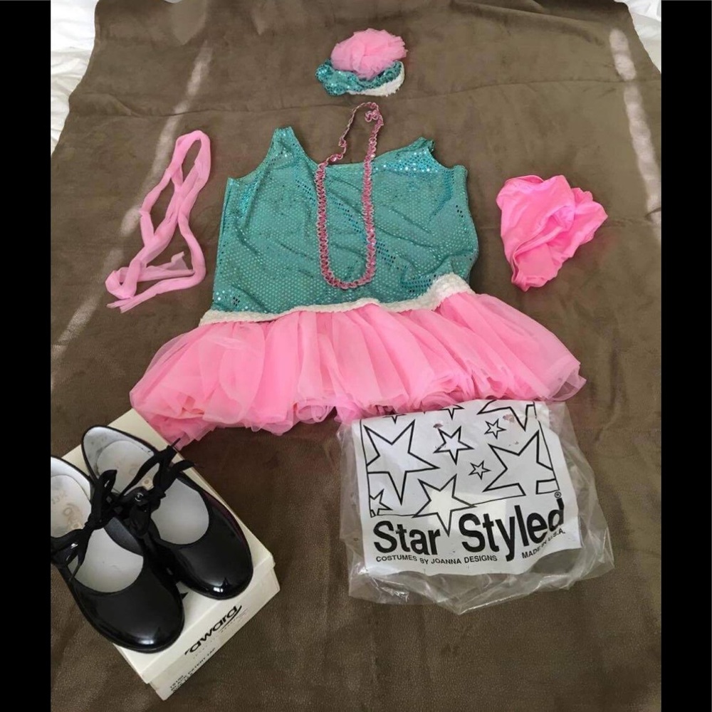 Child’s dance costume and tap shoes