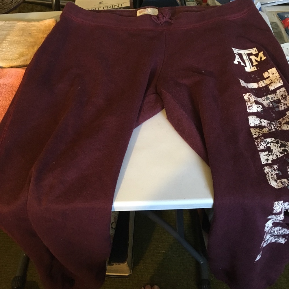 Texas sweat pants (has holes)