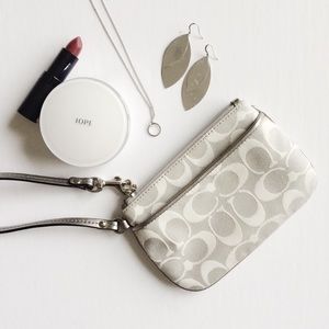 COACH Like New Silver Wristlet