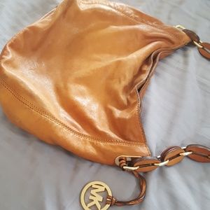 Camel color leather bag. Very nice