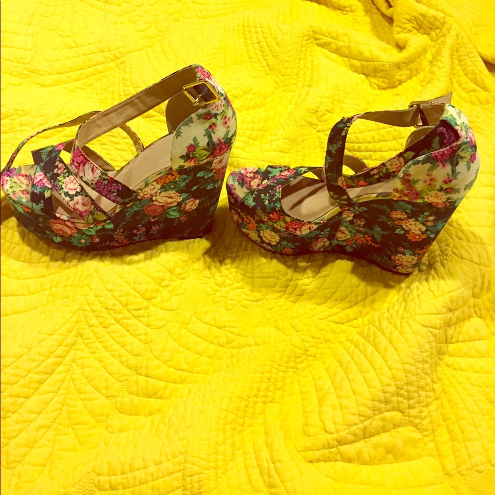 ALDO floral wedges.
