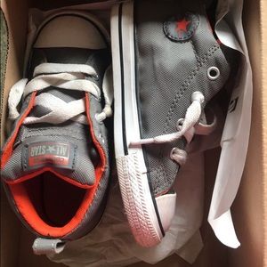Toddler size 9 converse shoes.