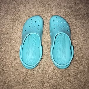 Turquoise blue crocs