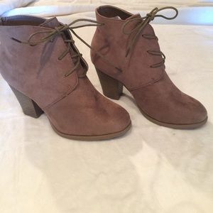 Tan suede ankle booties.
