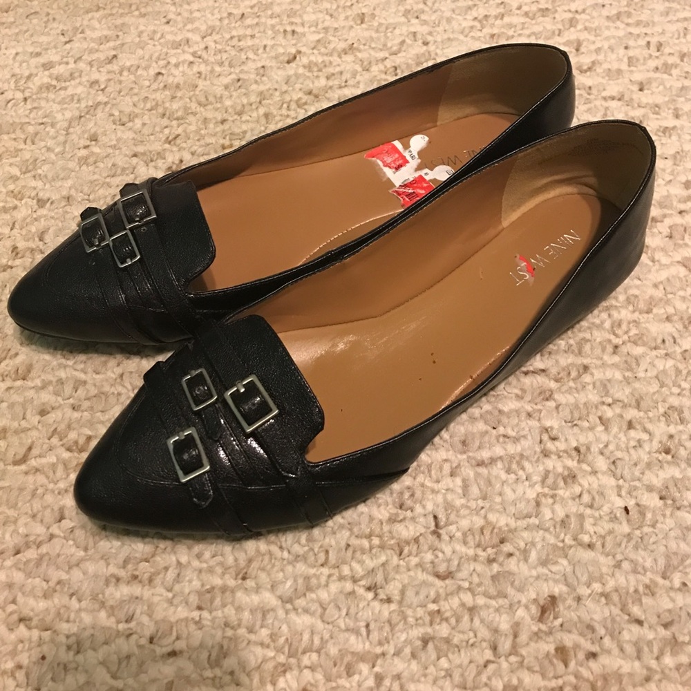 Black buckle flats