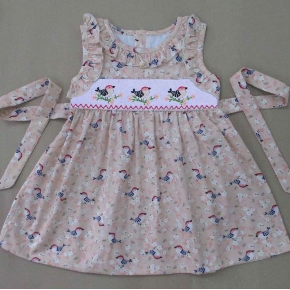 Bird pinafore smocked dress