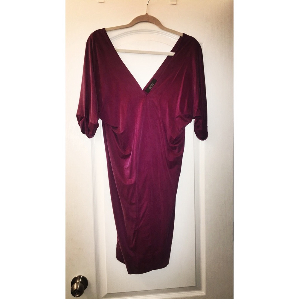 Plum colored quarter length sleeve dress