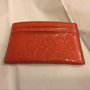 COACH burnt orange cardholder