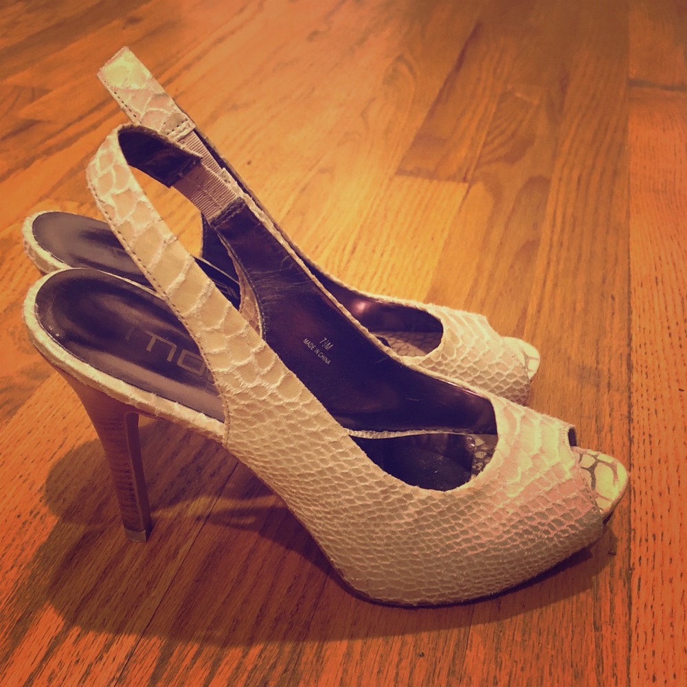 Neutral snakeskin and wood heels