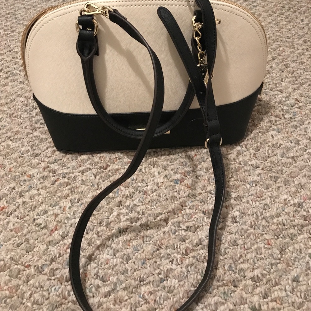 Cream and black purse