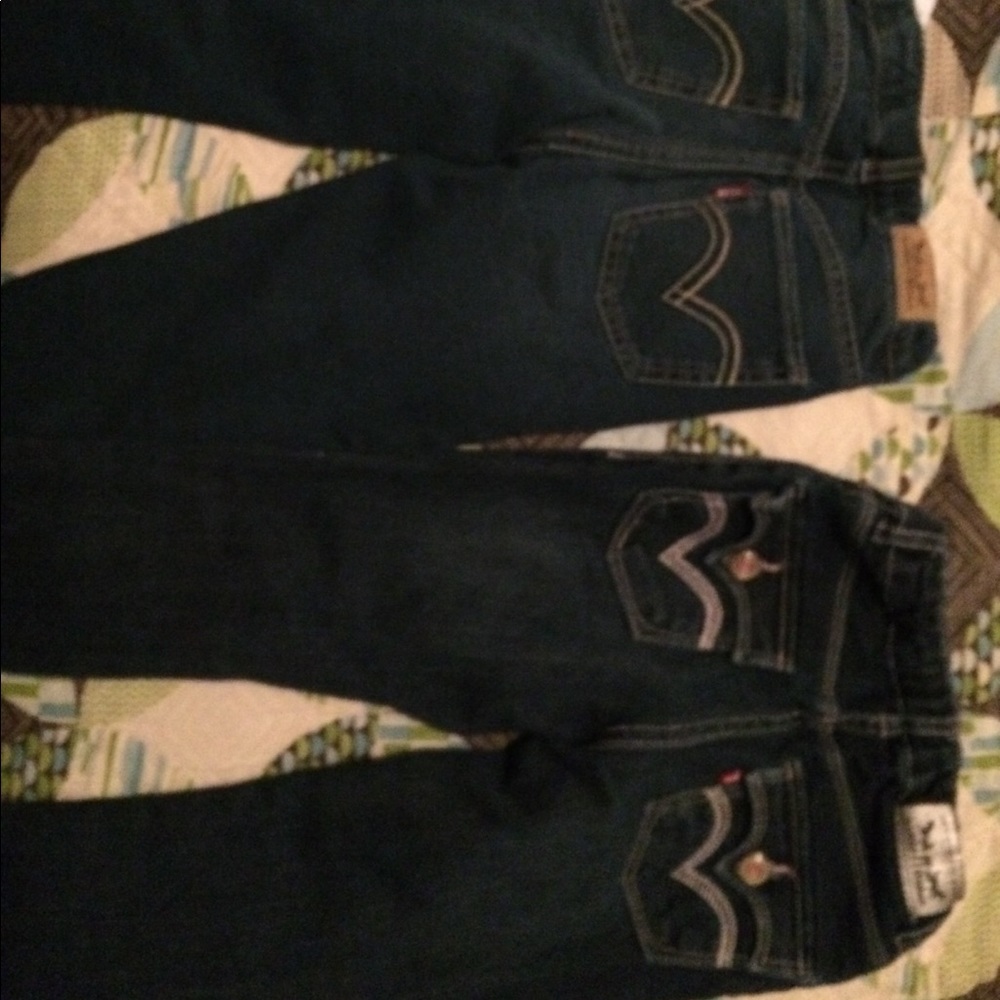 2 pairs of skinny stretch girls Levi jeans