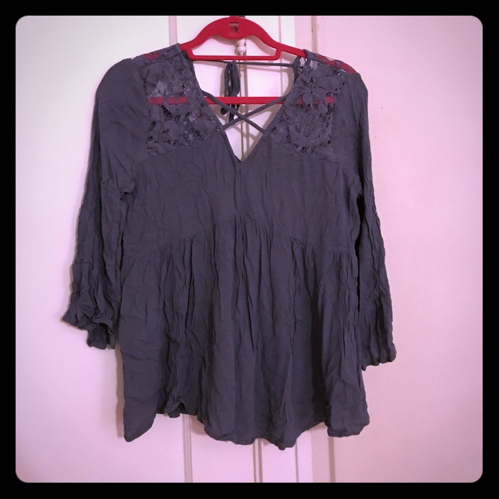 Cross front, open back long sleeve shirt