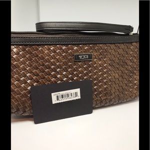 Tumi  basket weave wristlets