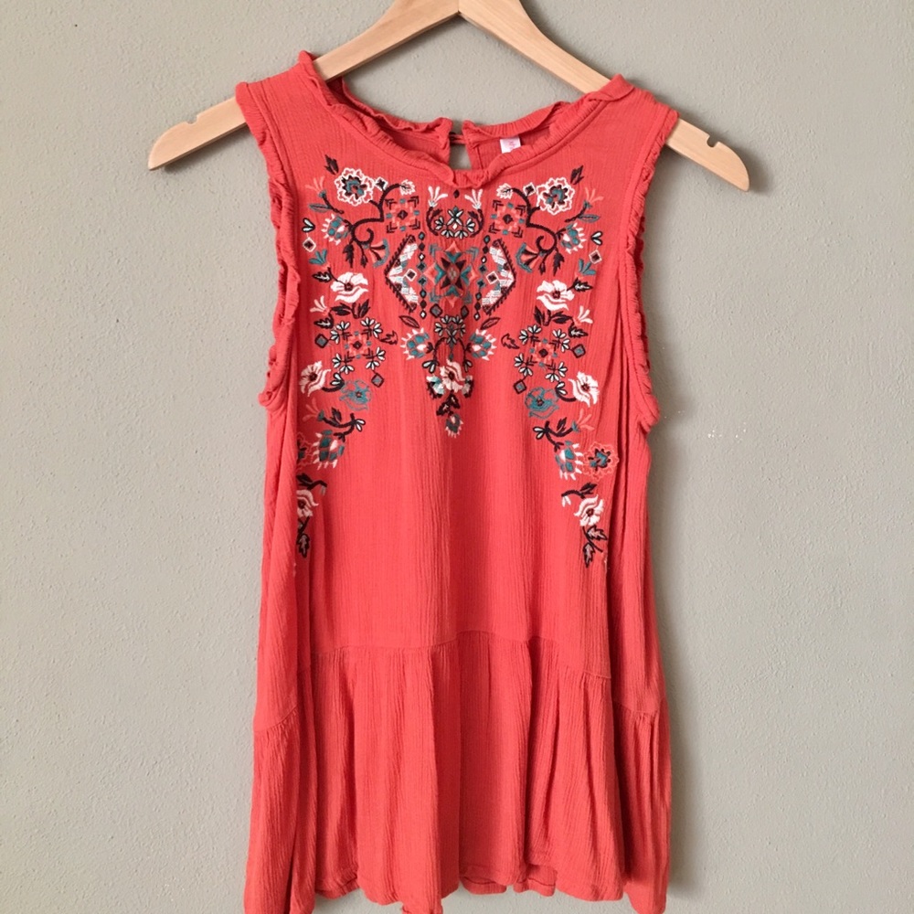 Orange sleeveless shirt