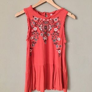 Orange sleeveless shirt