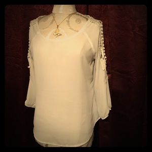 White blouse with open elbows beautiful trim