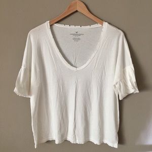 White bell sleeve shirt