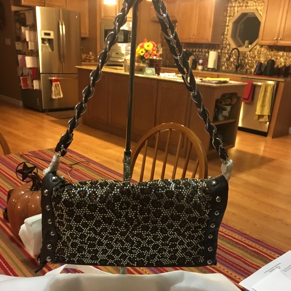 Schandra 4-way fold-over rockstar bag (leopard)