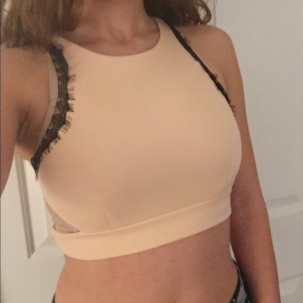 Light pink cropped top with black detailing