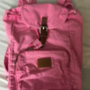 Pink small back pack.