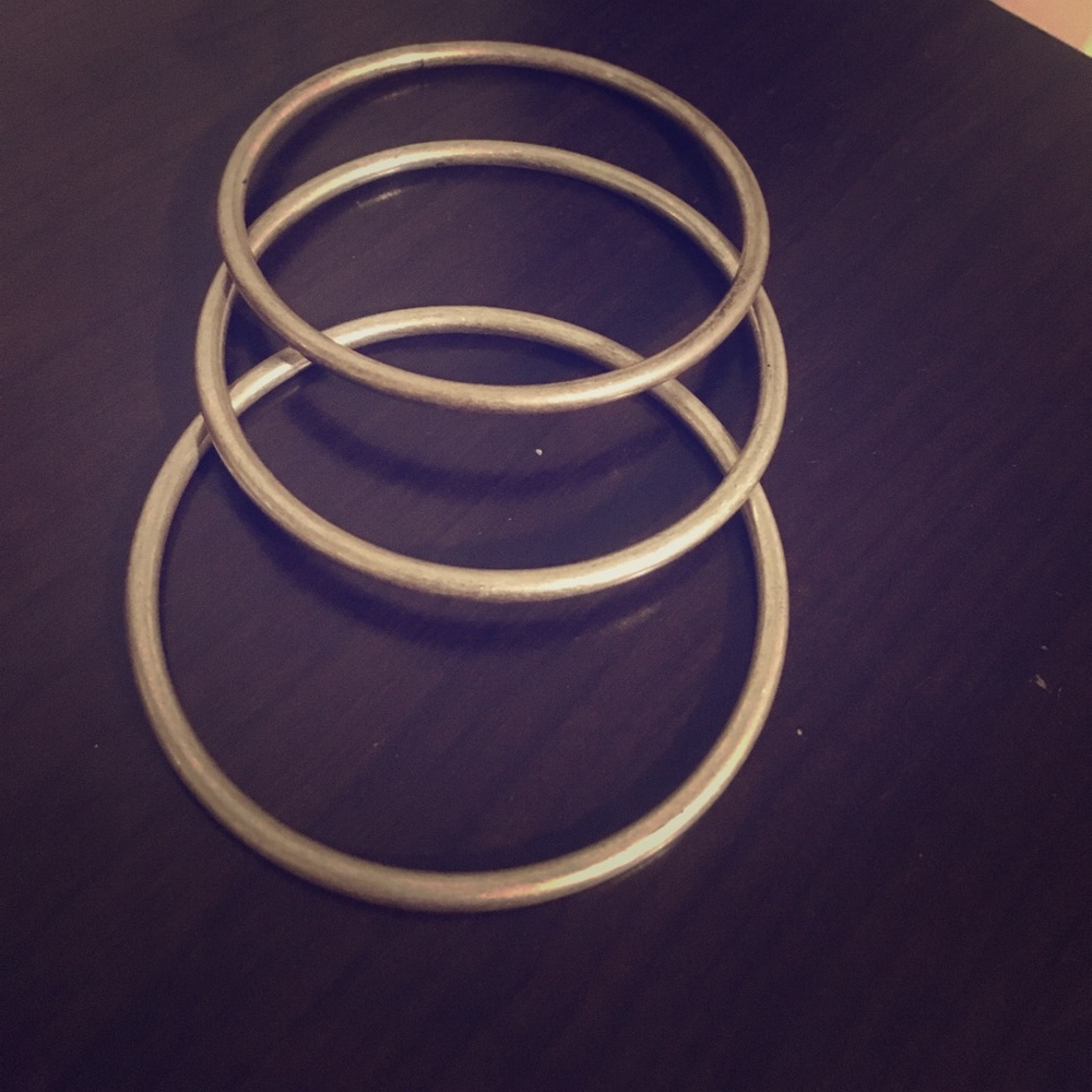 Three wrist bangles