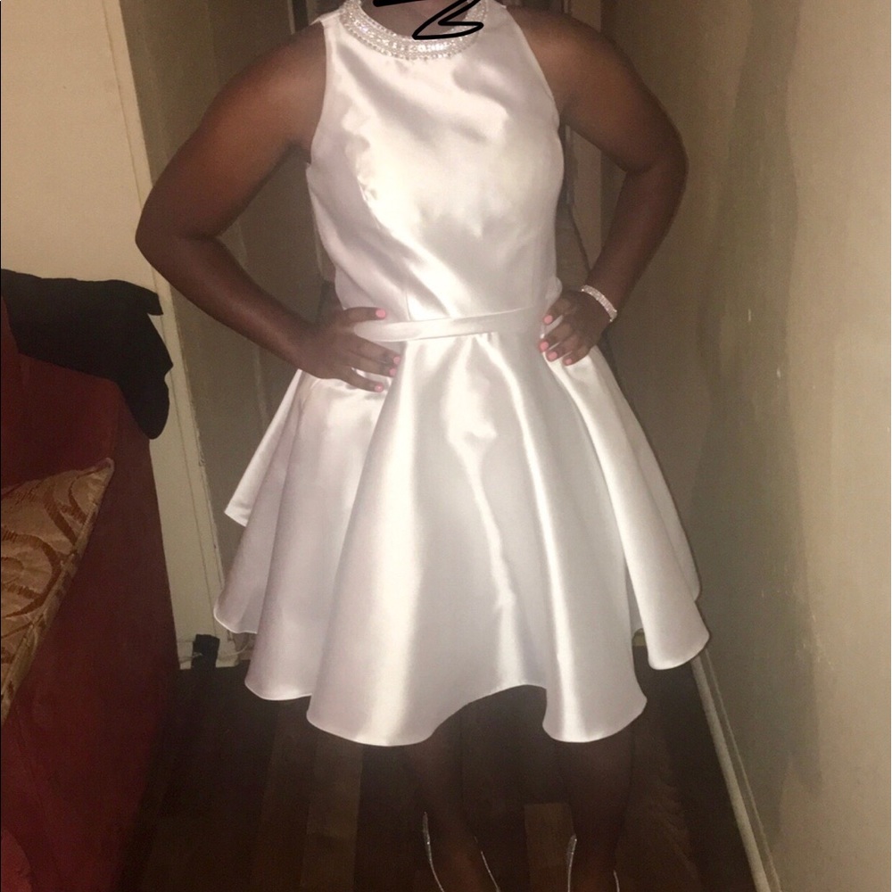 Elegant White short flare formal dress.