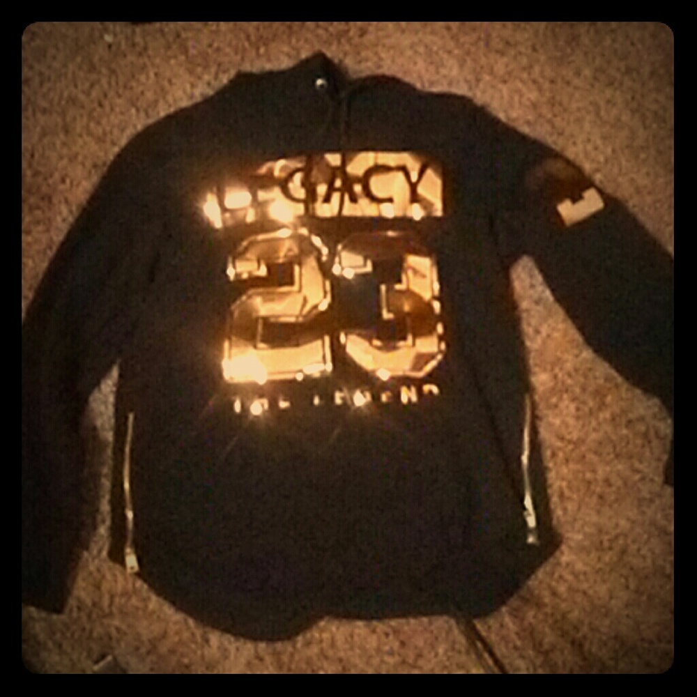 Legacy Jordan hoodie with gold lettering and gold