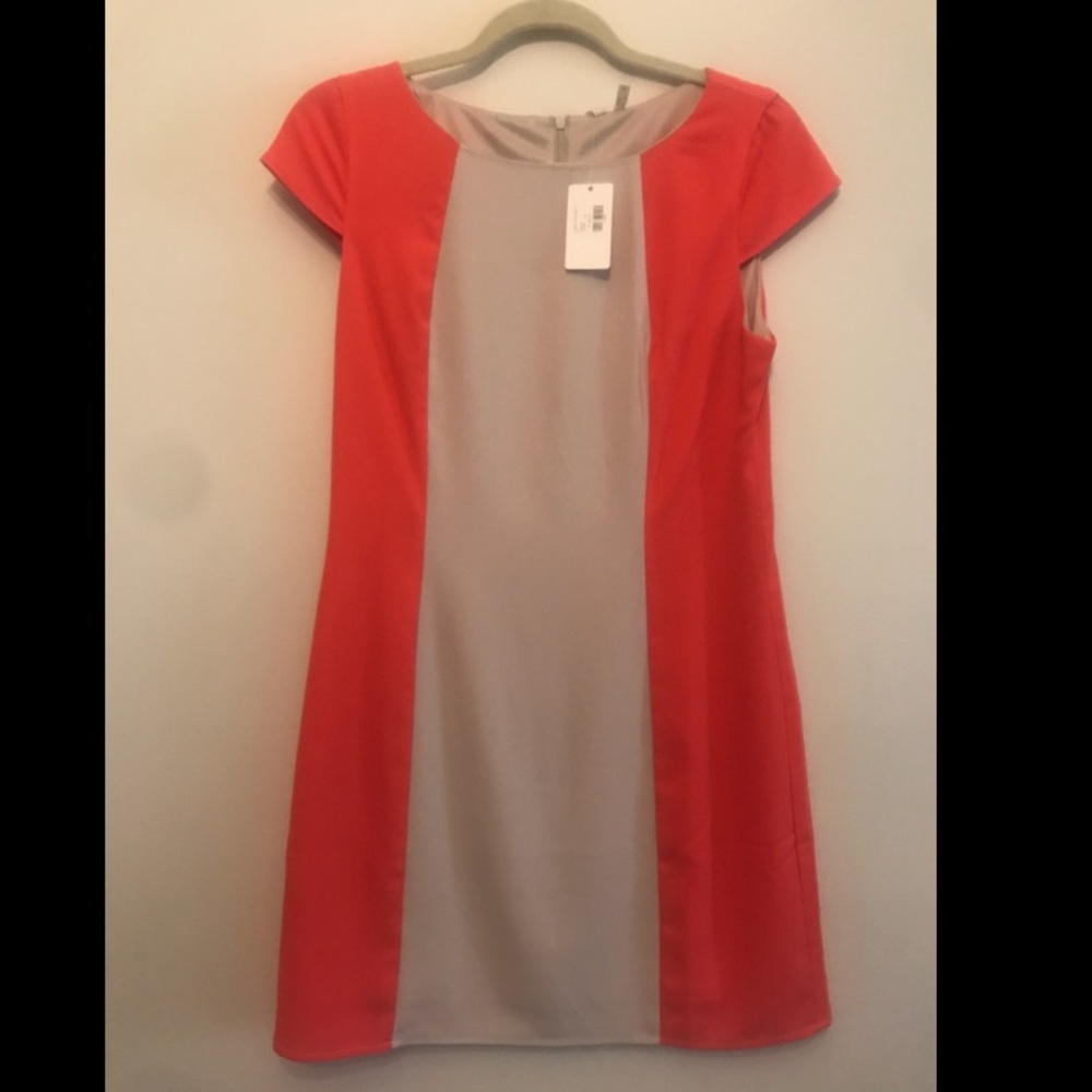 Never worn orange and cream cap sleeve dress