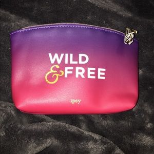 Ombré "Wild and Free" ipsy makeup bag. Never used.