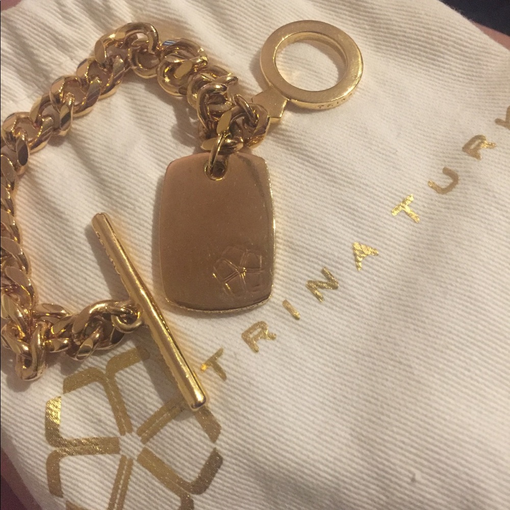 Gold Trina Turk bracelet with charm