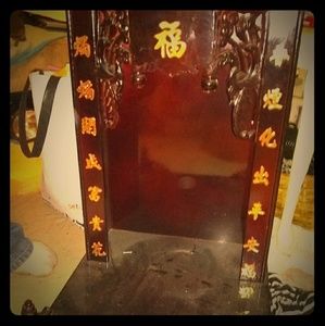 Its shrine.made out of wood 21 inches tall.