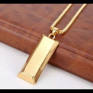 supreme gold bar