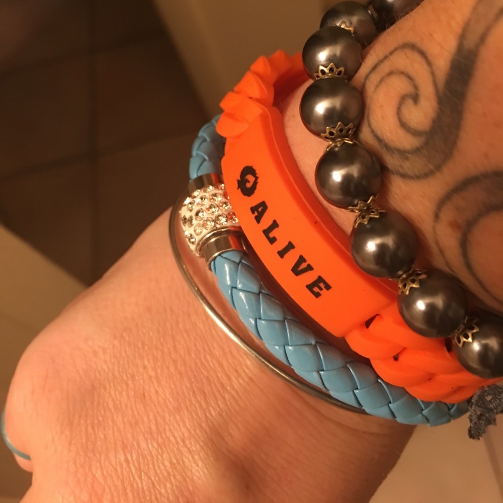 Orange "ALIVE"bracelet, blue braided one included