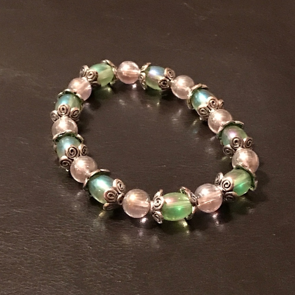 Stretch bracelet with beads and silver accents.