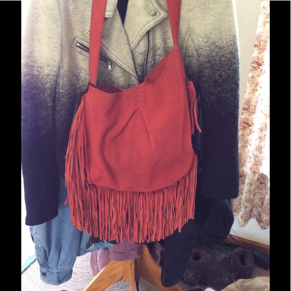 Stunning asymmetrical suede genuine MUXO bag.
