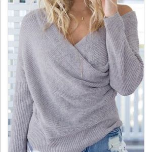 Cross v neck sweater