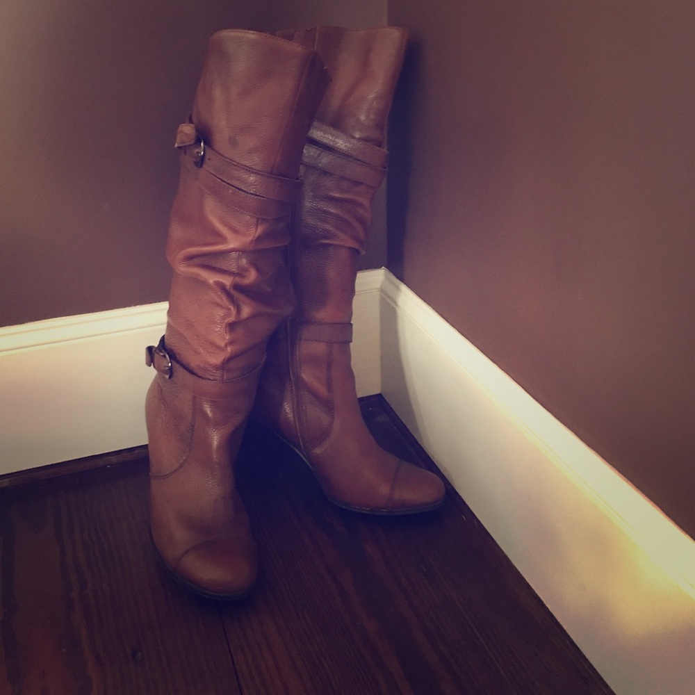 Pair of saddle brown belted boots - fall perfect!
